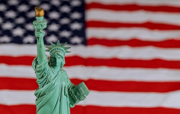 The Statue of Liberty the United States a symbol of freedom and democracy with flag of the United